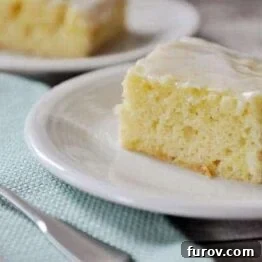 Zesty Glazed Lemon Yogurt Sheet Cake 4 A slice of Glazed Lemon Yogurt Sheet Cake