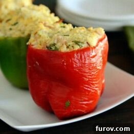 Cheesy Chicken Enchilada Stuffed Peppers on a white plate