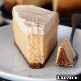 Autumn Delight Pumpkin White Chocolate Mousse Cheesecake Eggless and Gluten-Free Friendly 5 A delectable slice of pumpkin white chocolate mousse cheesecake, ready to be enjoyed.