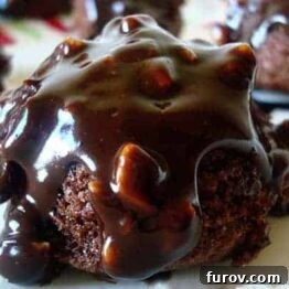 Delicious Chocolate Toffee Brownie Bites with a rich glaze.
