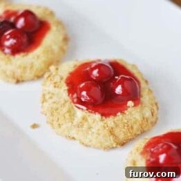 Delicious Cherry Cheesecake Cookies presented beautifully, inviting you to bake this amazing recipe.