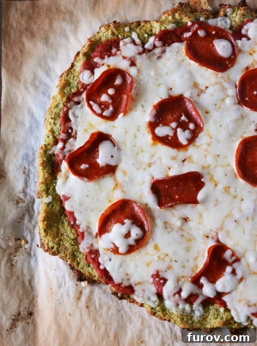 Wholesome Zucchini Pizza Base 2 Top view of a pepperoni zucchini crust pizza.
