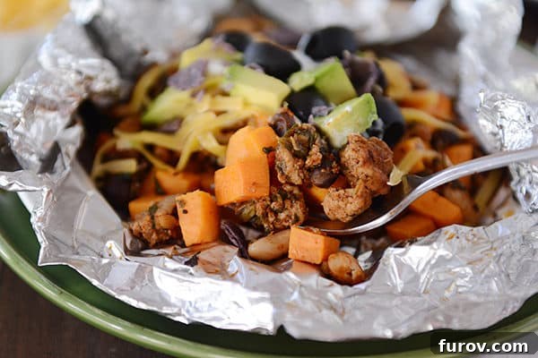 Foil Roasted Sweet Potato Tacos 3 Side view of a cooked foil packet sweet potato taco meal.