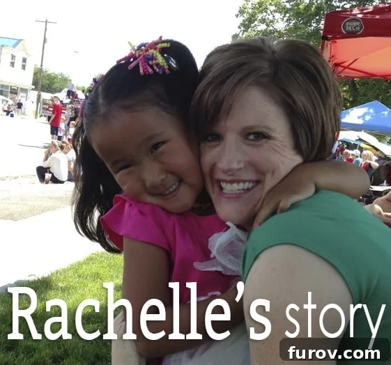 A woman hugging a little girl. 