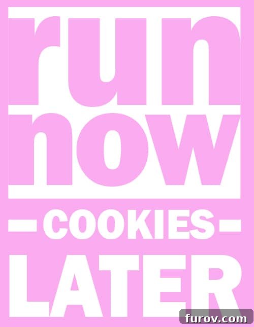 Motivational sign 'Run Now, Cookies Later' for half marathon runners.