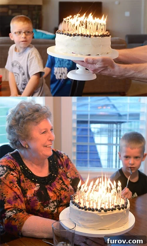 Lemon Blueberry Cake with all of the candles lit, being joyfully presented to our sweet neighbor Carol during a celebration.