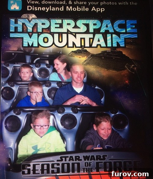 A family on a thrilling rollercoaster ride at Disneyland, enjoying the exhilaration.