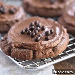 Pillowy Chocolate Frosted Swig Sugar Cookies 9 Frosted chocolate sugar cookie with chocolate pearls on metal rack.