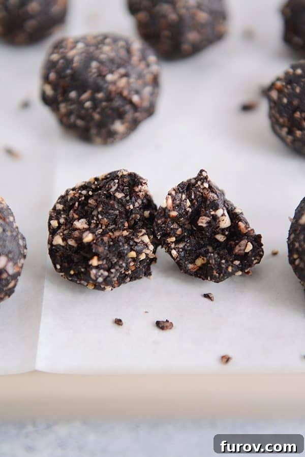 Healthy Dark Chocolate Almond Joy Bites with the front bite split in half. 