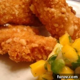 Macadamia-Crusted Chicken with Mango Salsa, a perfect family dinner idea.