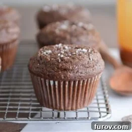 Double chocolate salted caramel muffin on cooling rack
