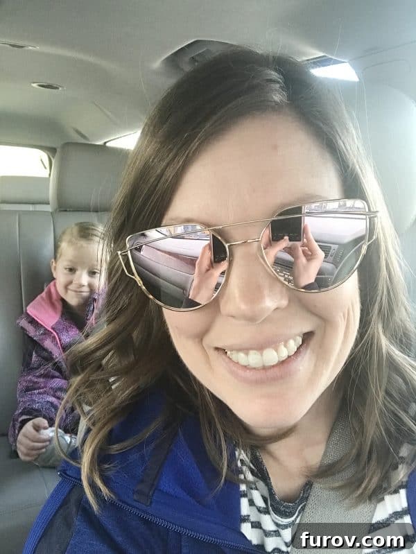 Friday's Horizon: Weekend Musings 5 A woman wearing sunglasses, looking at the camera with a playful expression.