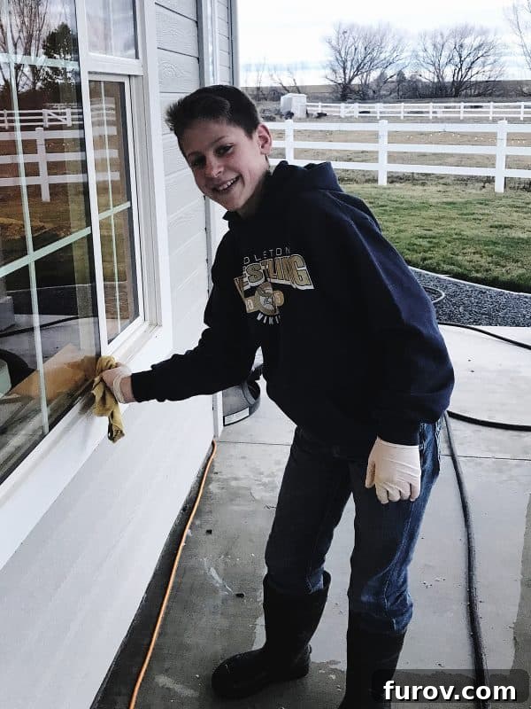 Teenager working on a swingset