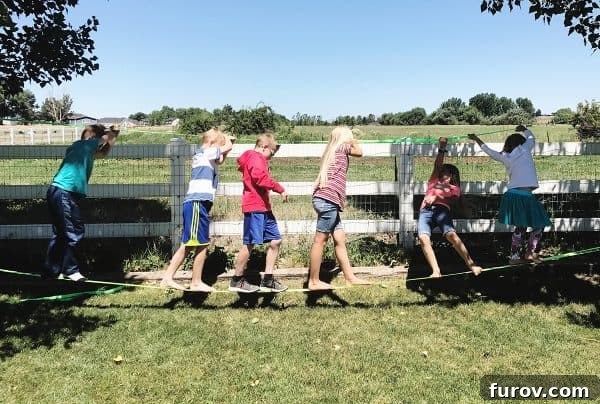 Kids playing on a slack line
