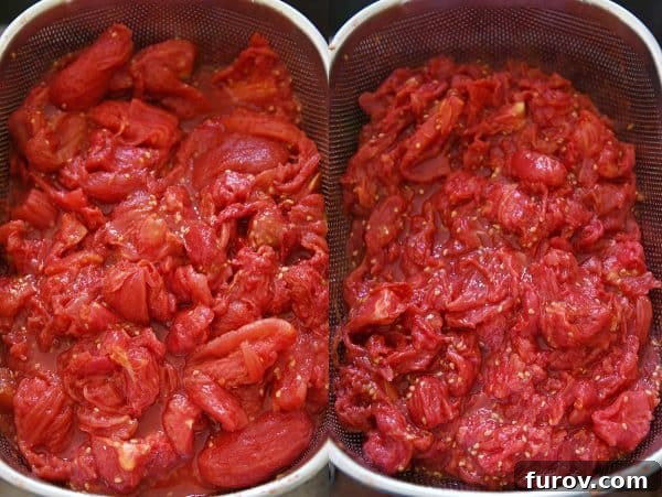 Draining tomatoes for homemade canned spaghetti sauce recipe.