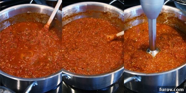Simmering sauce in large pot for homemade canned spaghetti sauce recipe.