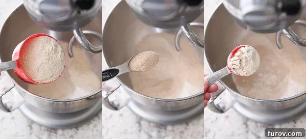 KitchenAid Small Batch Soft Fluffy Whole Wheat Bread Recipe 4 Dry ingredients (flour, vital wheat gluten, and yeast) being poured into a mixer bowl.