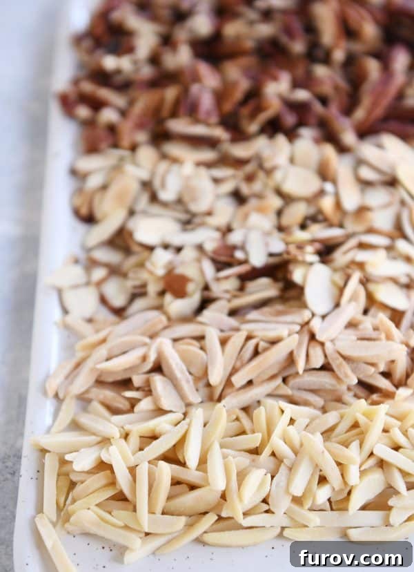 Get Perfectly Toasted Nuts in Your Microwave 5 A white tray of toasted nuts.