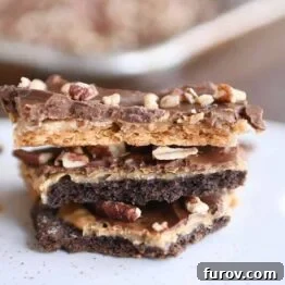 Stack of easy graham cracker toffee with peanut butter.