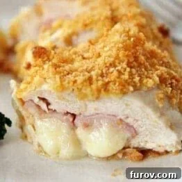 A perfectly cooked Chicken Cordon Bleu with a crispy crust.