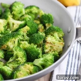 Skillet with roasted broccoli.