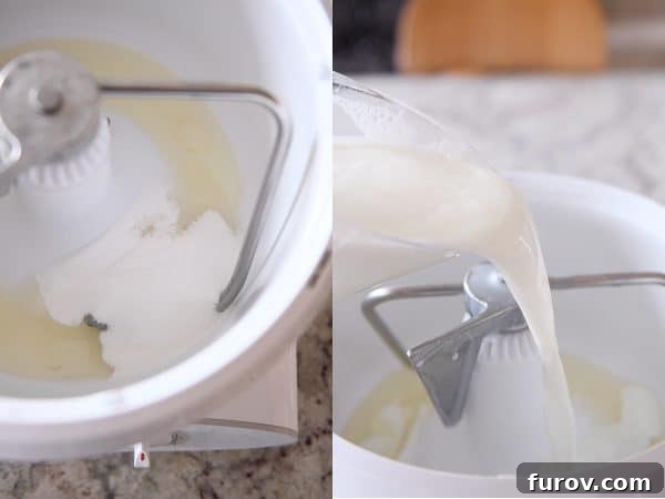 Master Cheryl's Famous Cinnamon Rolls: A Step-by-Step Guide to the Best Recipe and Baking Secrets 6 Sugar, oil, and scalded milk being mixed in a Bosch stand mixer, creating the initial liquid base for the cinnamon roll dough.