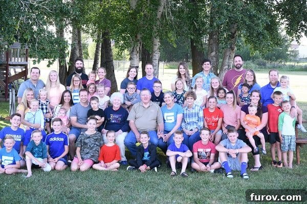 A group of family members gathered outdoors, enjoying a reunion activity.