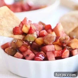 Vibrant Fruit Salsa with Cinnamon Sugar Crisps 8 Small white bowl with fruit salsa with baked cinnamon tortilla chips.