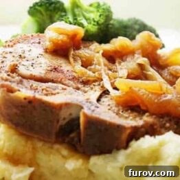 Tender Pork Chops with Caramelized Apples and Onions