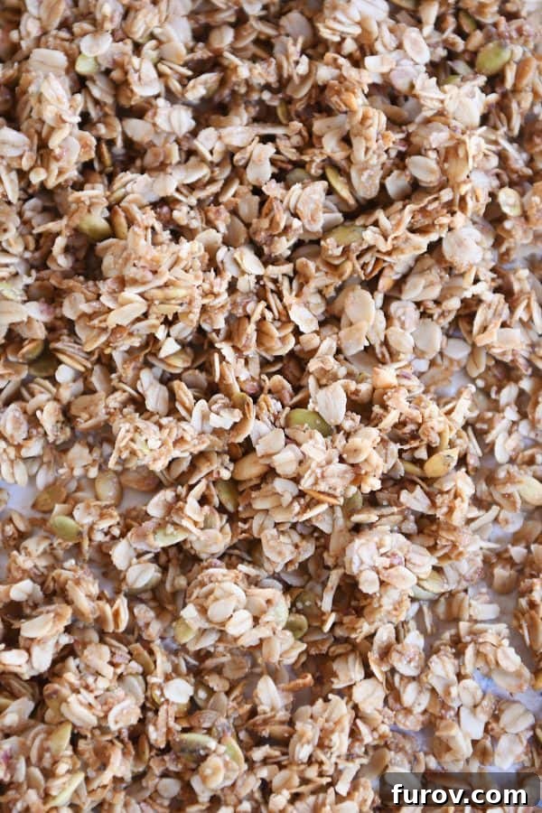 Sheet pan filled with brown butter pecan granola.