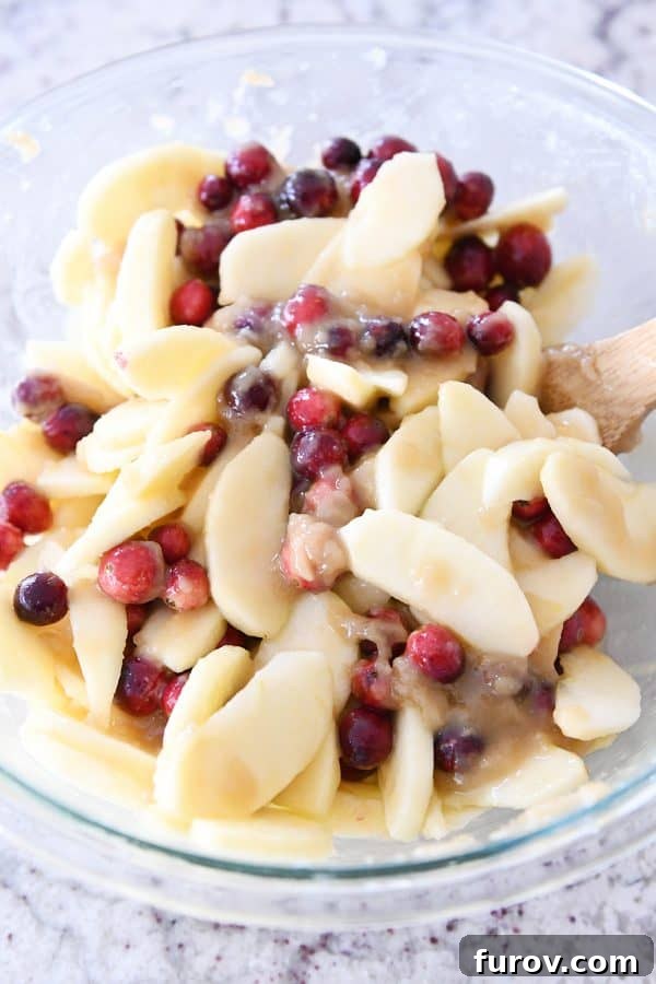 My Favorite Thanksgiving Apple Cranberry Pie 8 Apples and cranberries mixed with caramel sauce for pie.