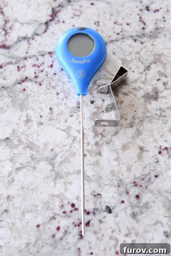 A Thermopop instant-read candy thermometer, a reliable tool for precise temperature control in candy making.