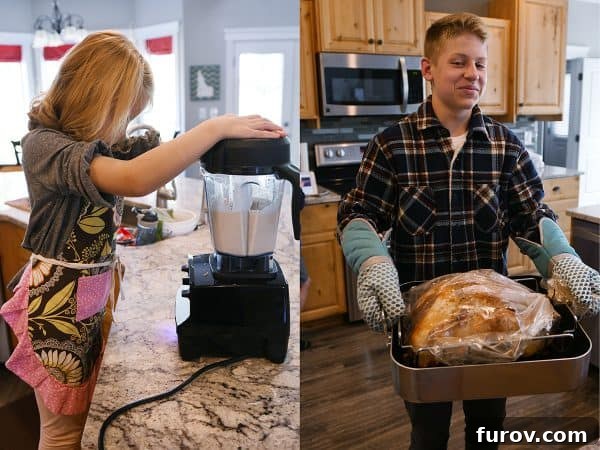 A young boy proudly presenting a freshly baked loaf of bread in a kitchen setting.