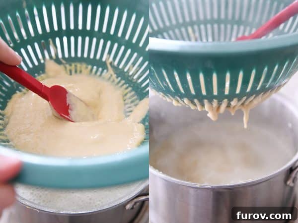 Whip Up Perfect German Spaetzle Quick Video Guide 11 Using colander and spatula to make homemade spaetzle.