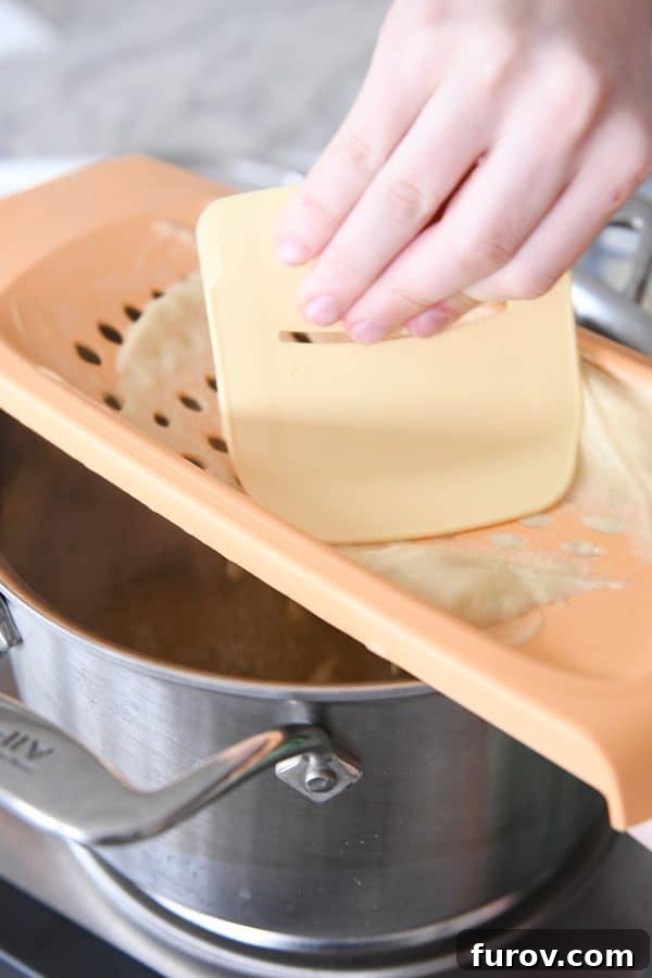 Whip Up Perfect German Spaetzle Quick Video Guide 8 Cooking homemade spaetzle.