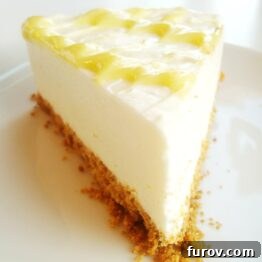 Small image of a lemon cheesecake slice with curd drizzle
