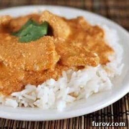 Chicken Tikka Masala served on a white plate