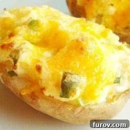 A dish of perfectly prepared Twice Baked Potatoes.