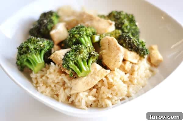 A perfectly portioned serving of Simple Orange Chicken with Broccoli in a white bowl, ready to be enjoyed over rice.