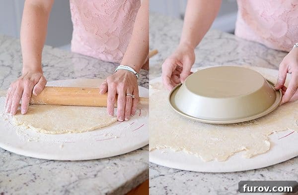 Unlock the Secret to Flaky Homemade Pie Crust 16 A baker using a rolling pin to flatten and expand the pie crust dough.