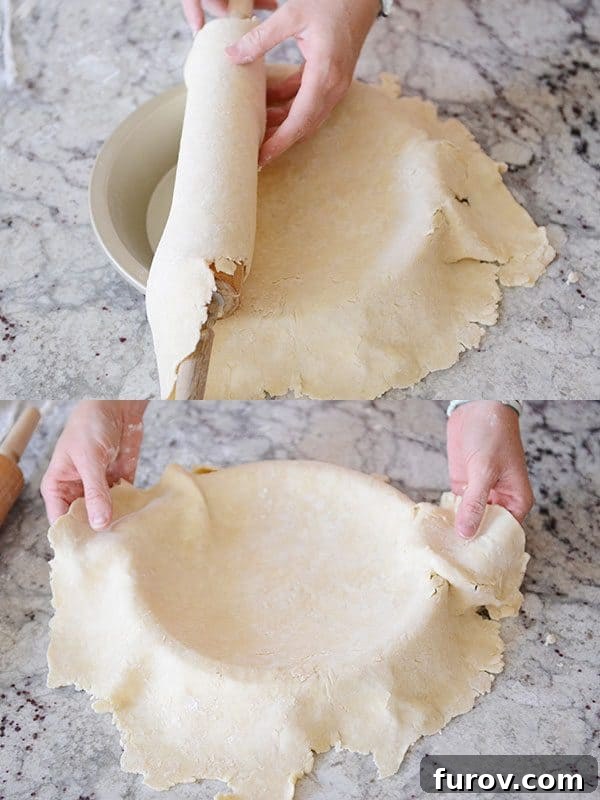 Unlock the Secret to Flaky Homemade Pie Crust 18 Pie crust dough being carefully unrolled and laid into a pie dish.
