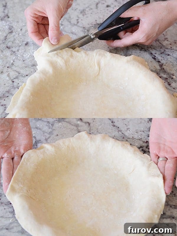 Unlock the Secret to Flaky Homemade Pie Crust 21 Kitchen scissors trimming the excess pie crust dough around the edge of a pie dish.