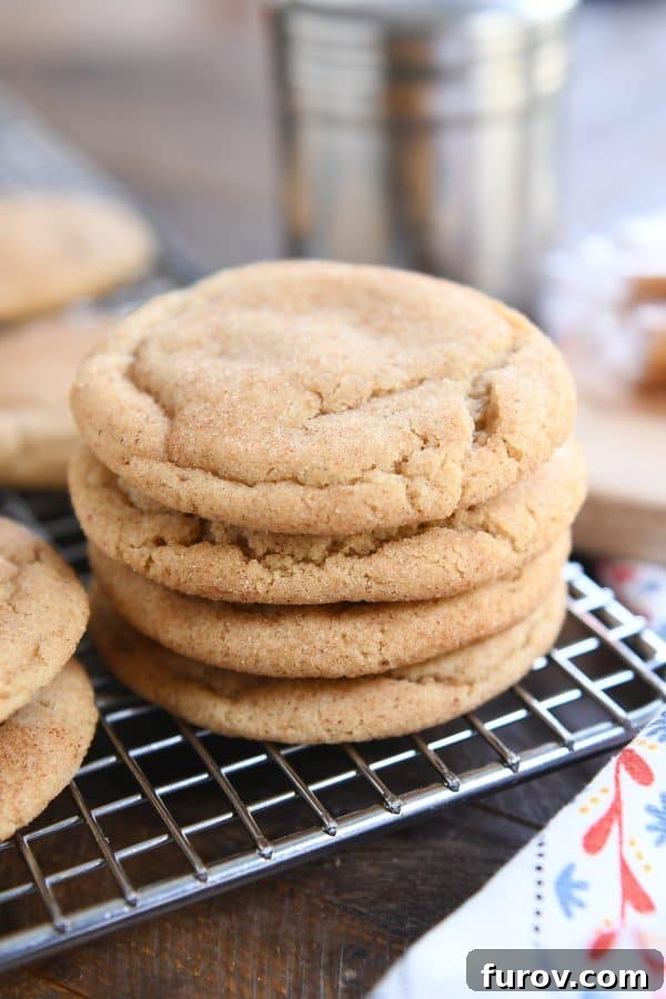 Stack of brown butter caramel snickerdoodles on cooling rack.