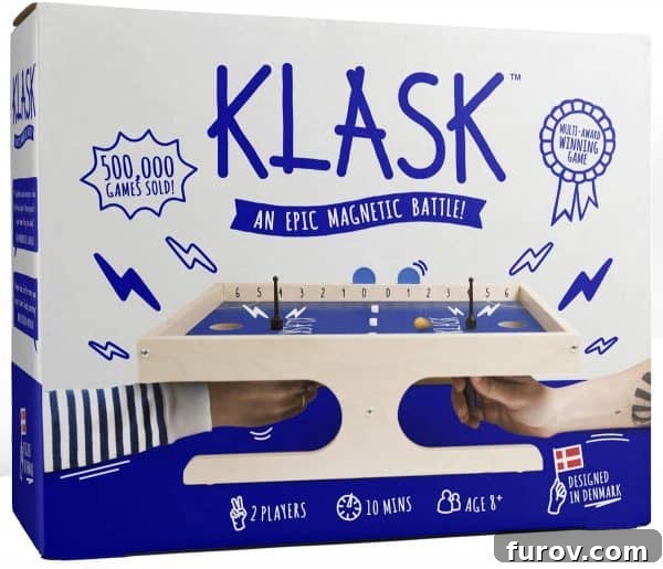 The exciting Klask game set up for play, featuring its unique magnetic pieces and scoring system, ready for a fun family competition.