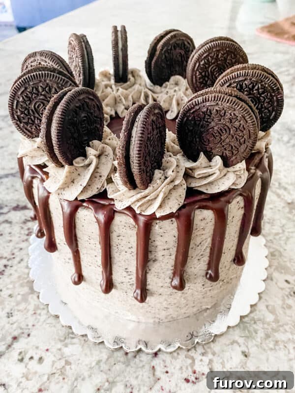 a decadent Oreo cake with creamy filling and cookie pieces, showcasing a show-stopping dessert