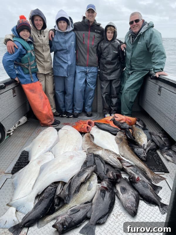 men on a boat proudly displaying their fish catch, symbolizing a successful and memorable fishing trip