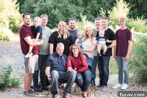 large family in a family portrait by a river, symbolizing cherished memories and family bonds