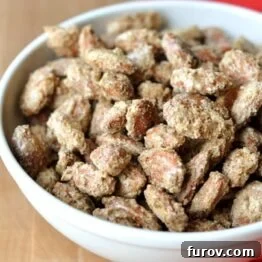 White bowl full of candied almonds.