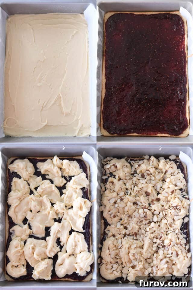 Luscious Raspberry White Chocolate Blondies 5 Assembling raspberry white chocolate blondie bars in 9X13-inch pan with batter, raspberry jam and sliced almonds.