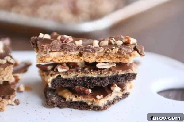 20+ Homemade Candies You'll Adore 2 Stack of easy graham cracker toffee with peanut butter, a perfect homemade candy for the holidays.